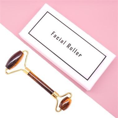 Gelbe Tigerauge Gesichtsbehandlung Roller